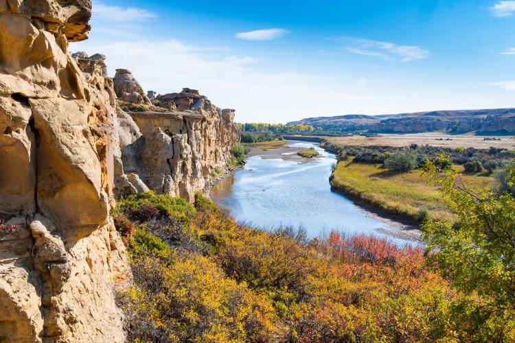 Landscape of Writing on Stone Provincial Park - sandstone cliffs above a river